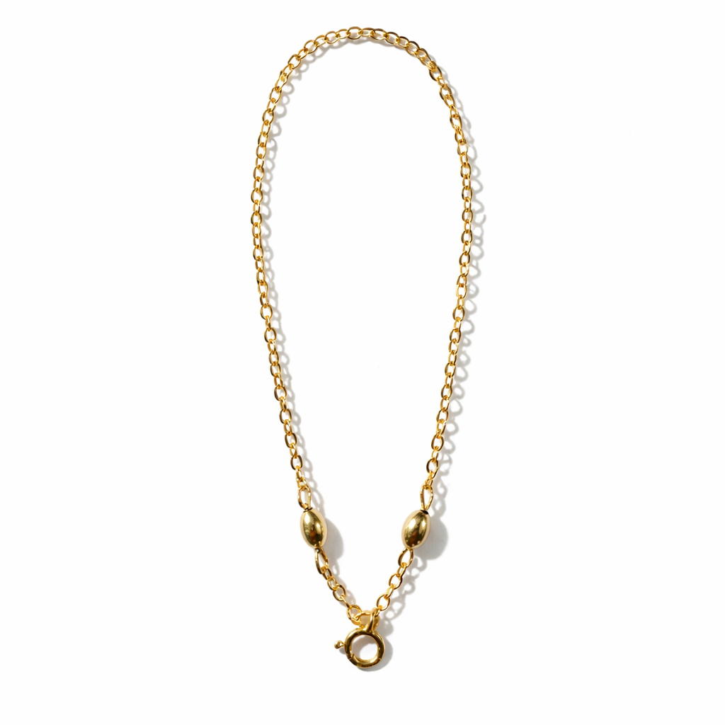 The Gold Connector with Double Bead